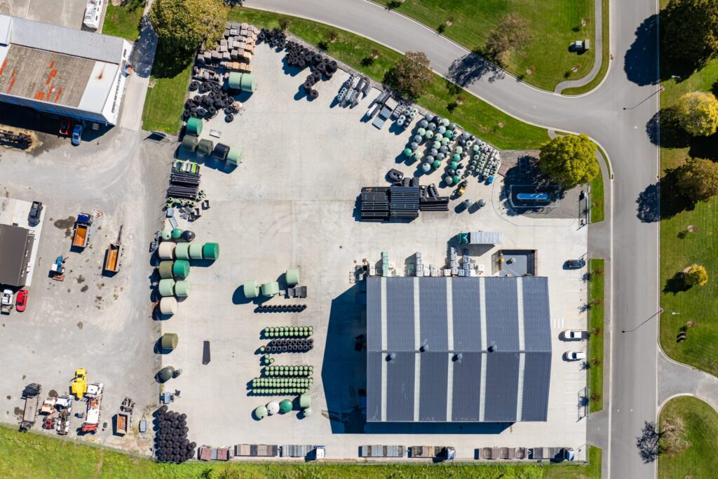 Maugers_Property_Innovation_Park_Drone_Shoot_13_3_26_Small_100 Large aerial view of warehousing site with expansive yard space, storage compounds and commercial building infrastructure at Innovation Park Christchurch. Ideal for commercial leasing, industrial property operations, agribusiness use and property for business requiring outdoor operational space.