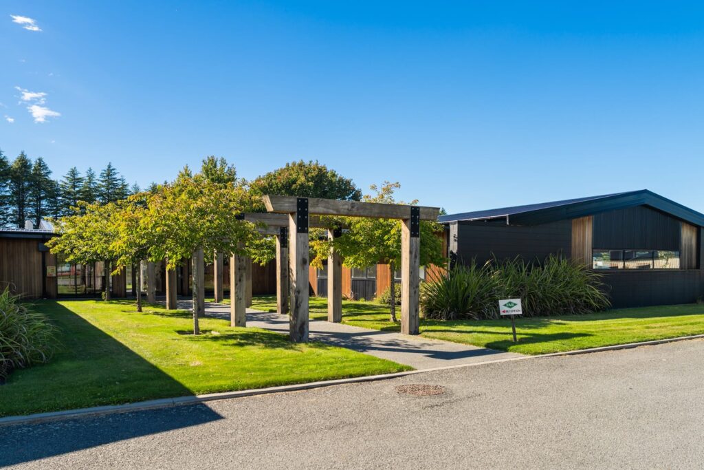 Maugers_Property_Innovation_Park_Drone_Shoot_13_3_26_Small_159 Attractive office space and landscaped commercial building with covered walkway inside Innovation Park Christchurch. Perfect for business leasing, commercial spaces and property companies seeking a modern campus environment in a leading development property.