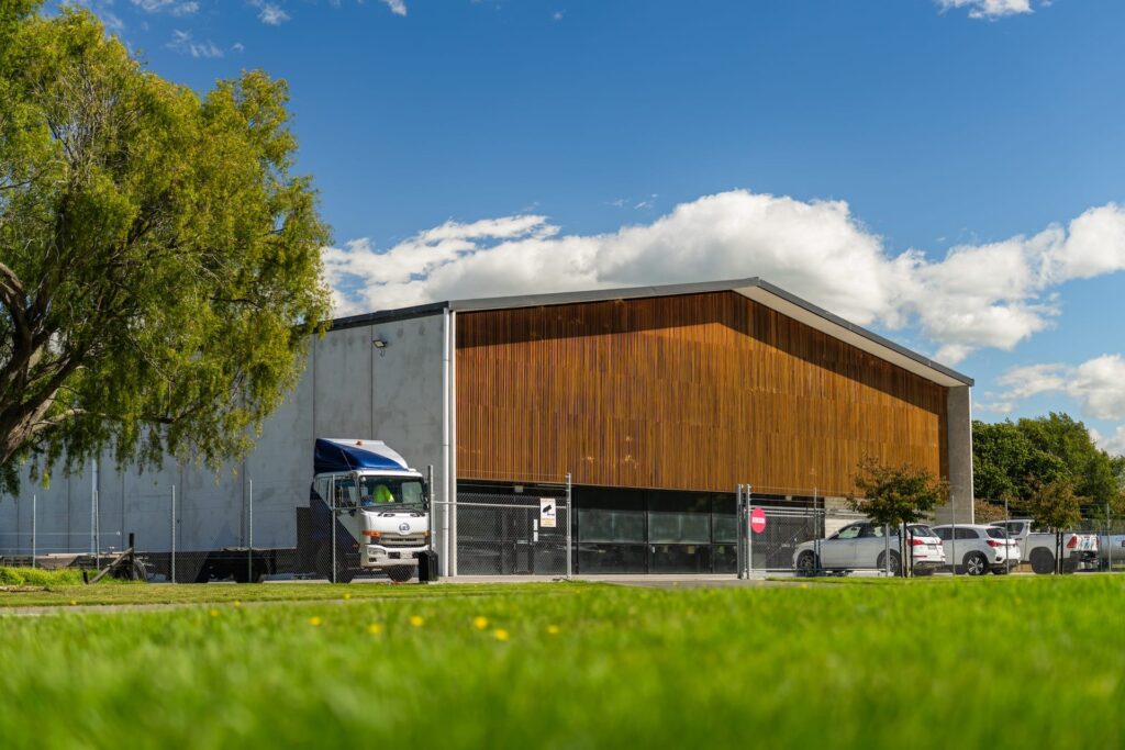 Maugers_Property_Innovation_Park_Drone_Shoot_13_3_26_Small_168 Modern commercial building with truck access, office space frontage and secure parking at Innovation Park Templeton. Suitable for commercial leasing, warehousing support, property investment and businesses needing premium industrial property facilities.