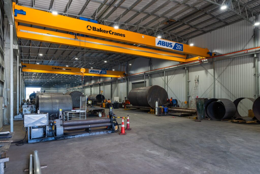 Maugers_Property_Innovation_Park_Drone_Shoot_13_3_26_Small_196 Large-scale warehousing facility with overhead cranes and industrial workspace inside Innovation Park Christchurch. Perfect for industrial developments, agribusiness operations, commercial leasing and property for business requiring heavy-duty commercial spaces.